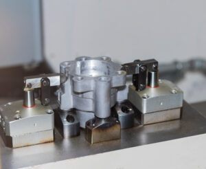 custom automotive fixture for CNC machining with part installed in the fixture