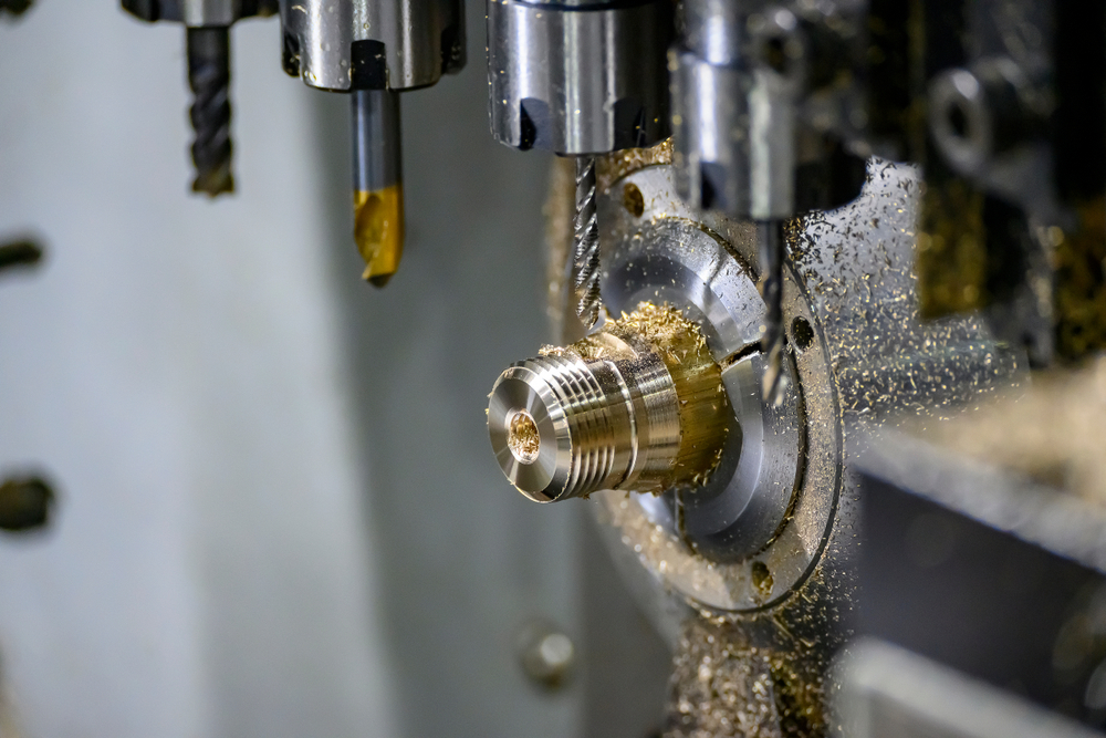 Swiss machine gang tooling, machining a brass part